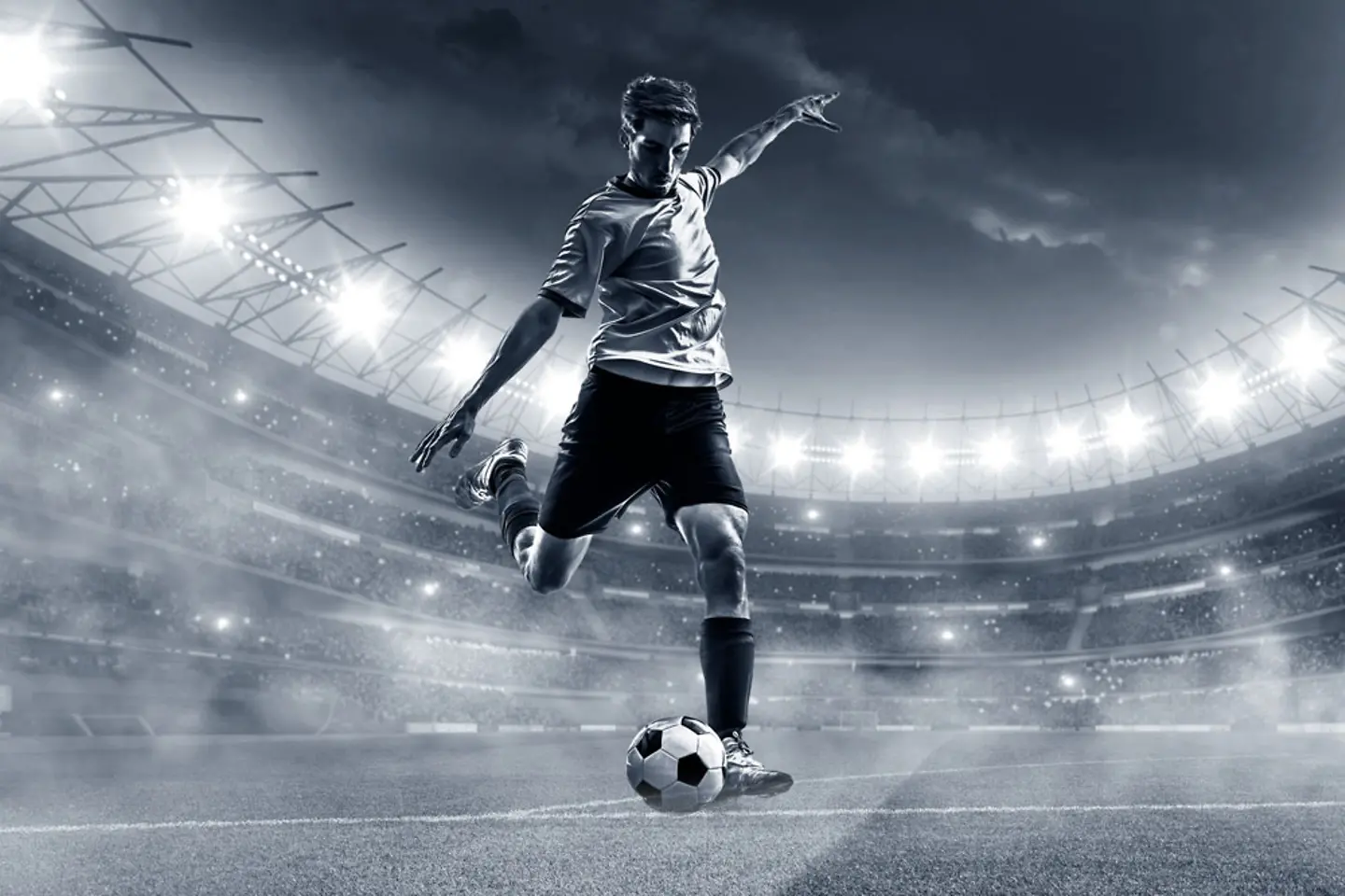 estádio de futebol com os espectadores ao fundo