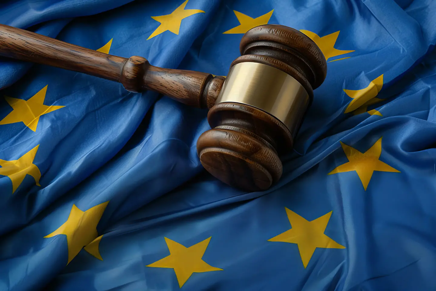 Judge's gavel on the flag of the European Union, representing european laws