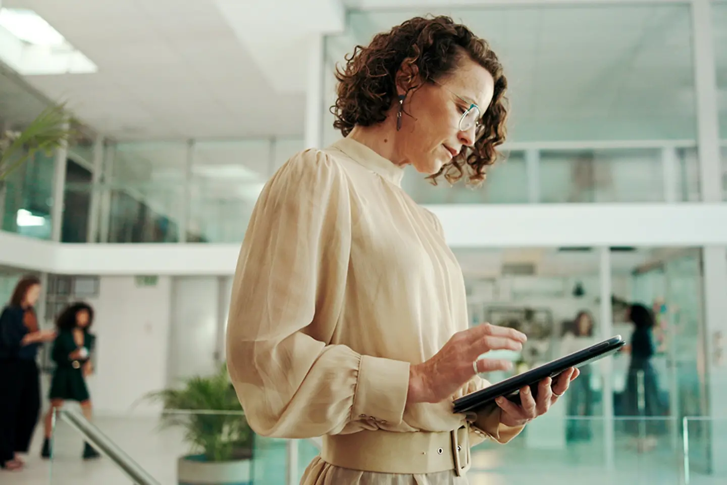 Woman using tablet in office