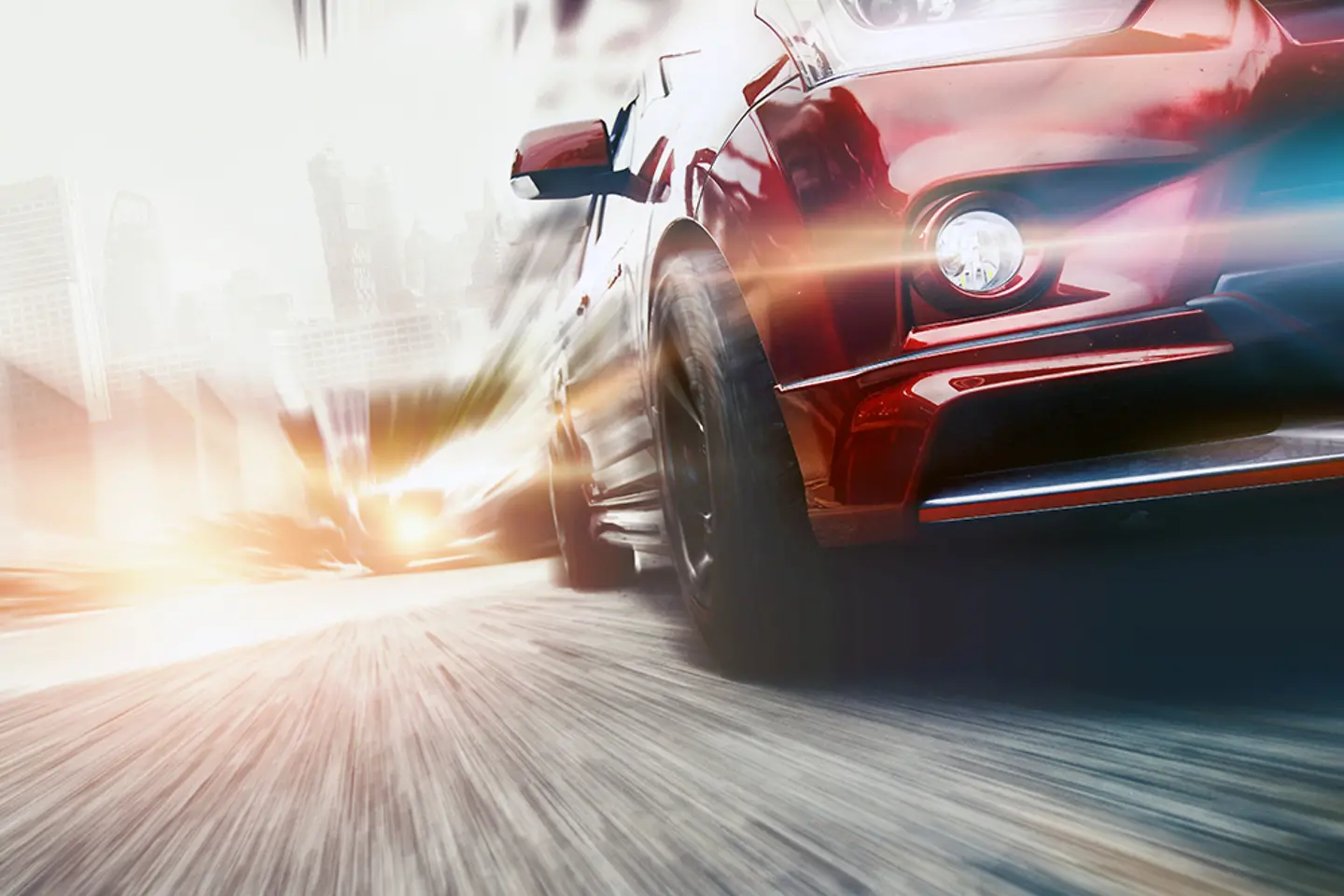 Ein rotes Auto, das schnell auf der Straße fährt