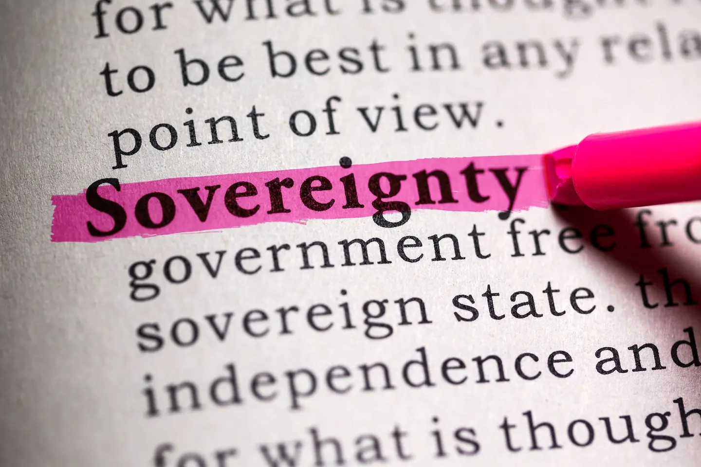 The English word sovereignty is marked with a highlighter in a text