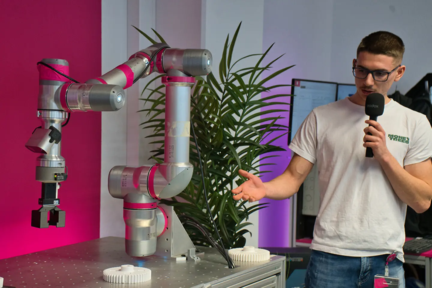 Expert explaining the use of a special robotic arm
